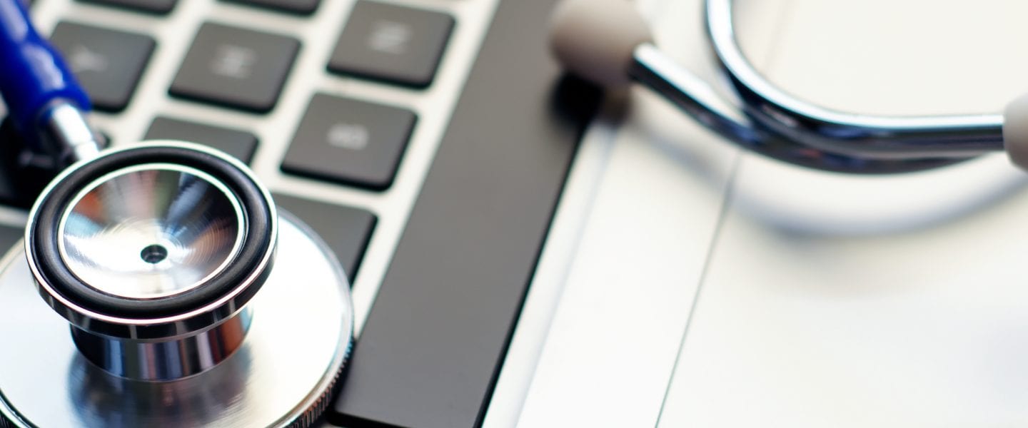 Stethoscope on Computer Laptop Keyboard